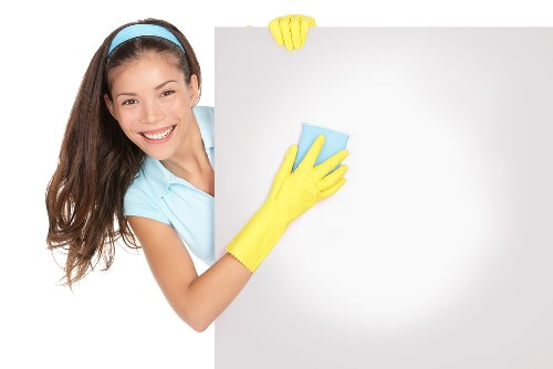 Cleaning kitchens, desks, and washrooms in a Canary Wharf office building